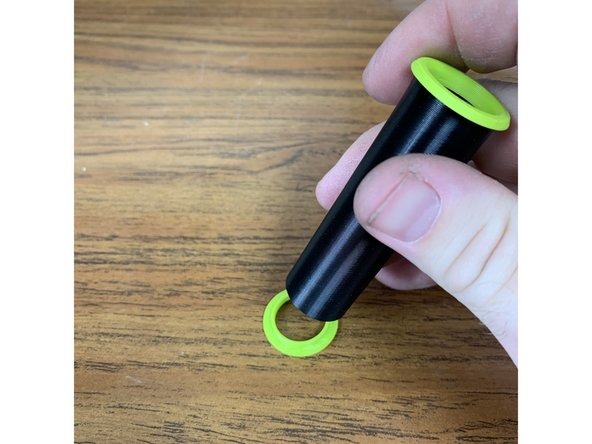 Press a flange into each end of each roller tube. This should get you 12 total rollers (six for each pipe) NOTE: One end of the printed roller tube may be slightly narrower than the other where it adhered to the print bed. If you are having a hard time pressing it on, use a de-burring tool or hobby knife to open it up slightly.