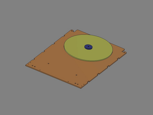 IMG 2 - The parts will stack/align as shown. Note that the Hub Flange Nut will come up through the bottom of the Tray utilizing the rear most hole.