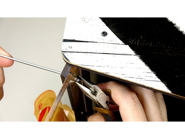 Start threading through 14mm bolts from the top of the Clamp panel, trough the vinyl.