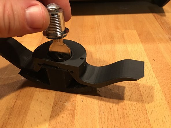 Slide the top handle into the base handle channel so that the slit lines up with each.