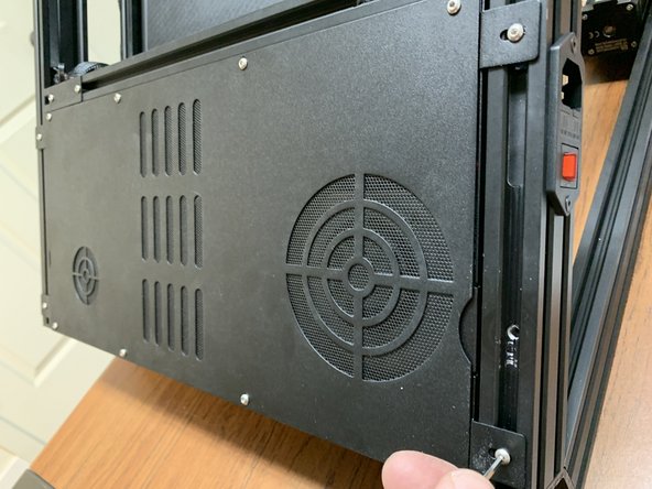 Remove the four screws holding the electronics tray to the frame.