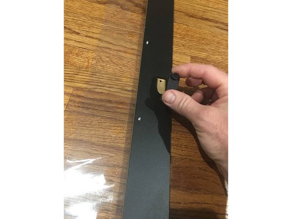 Flip the whole thing over, so that now the logo is facing the table and the vinyl is between you and the plate as pictured.