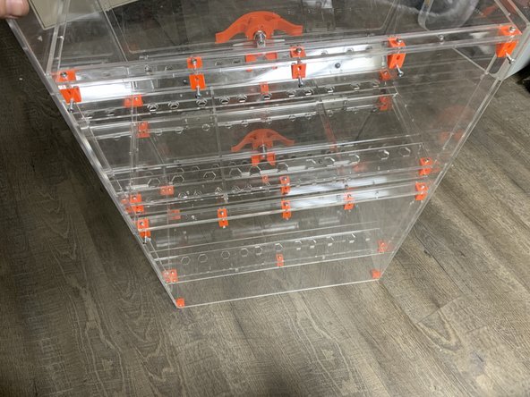 Carefully stand the now joined boxes up so its resting vertically on its feet as it will be when assembly is complete.