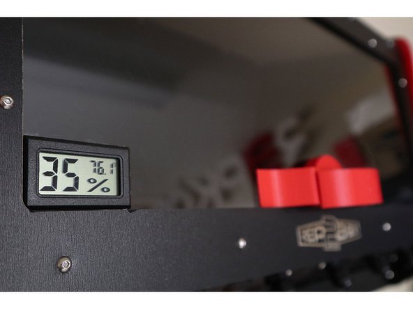 GENTLY Insert your hygrometer into the cutout provided in the lid and proceed back to the lid assembly in step 9 of the Main Assembly guide.
