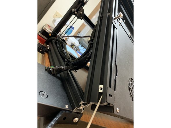While the angle bracket is out of the way add another slide nut to the side of the extrusion closest to the display as shown. This is what the security bracket will connect to.