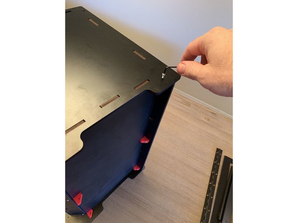 ONLY FASTEN THE BOTTOM TWO CORNERS OF EACH SIDEPANEL FOR NOW