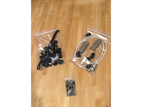 Acrylic  Lid,  Small Vinyl Hinge, Large Vinyl Hinge,  Steel Base Support Beam, Graphic Side Panels (Default now is Black Repkord R Panels, Custom Panels Like The Ones Pictured are an Available upgrade)