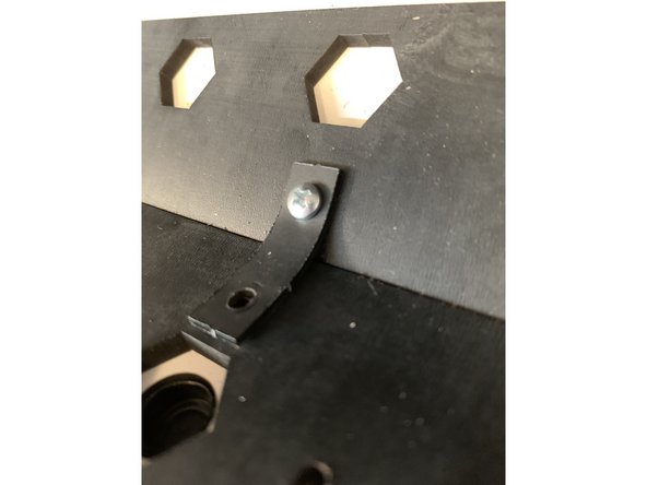 RepBoxes produced between late March and Mid-April 2021 may have come with a longer exit clamp strip on Sheet S. It is installed as follows but has since been replaced with our new printable Exit Clip stored in our public file repository here. We recommend printing one to replace the old strip design.