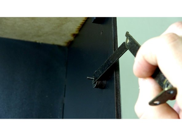 Place the Hinge over the bolt, followed by a washer.