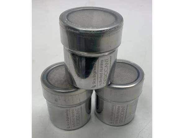 These desiccant canisters can be inserted directly into the filament spools before loading them intothe RepBox OR they can be placed inside the front exit panel laying on their side.