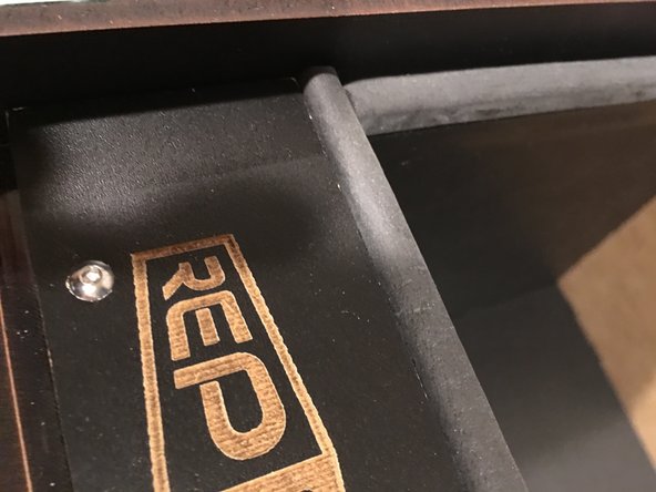 Trim excess gasket from the ends of the faceplate.