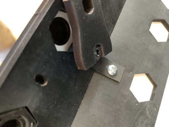 RepBoxes produced between late March and Mid-April 2021 may have come with a longer exit clamp strip on Sheet S. It is installed as follows but has since been replaced with our new printable Exit Clip stored in our public file repository here. We recommend printing one to replace the old strip design.