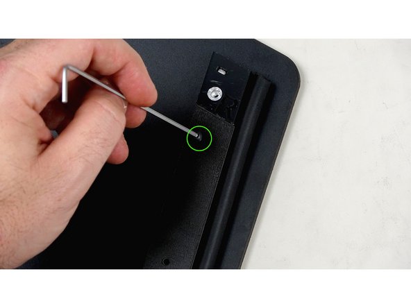 From the top of the panel, use a 16mm bolt to secure the seal bar in place.