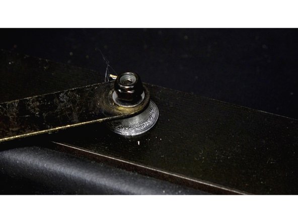 Place a  3D Bushing on the bolt.