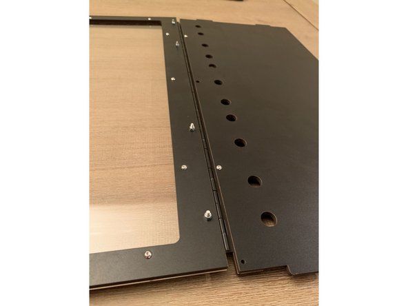 Next we attach the lid assembly to the top panel as shown in pic 1.