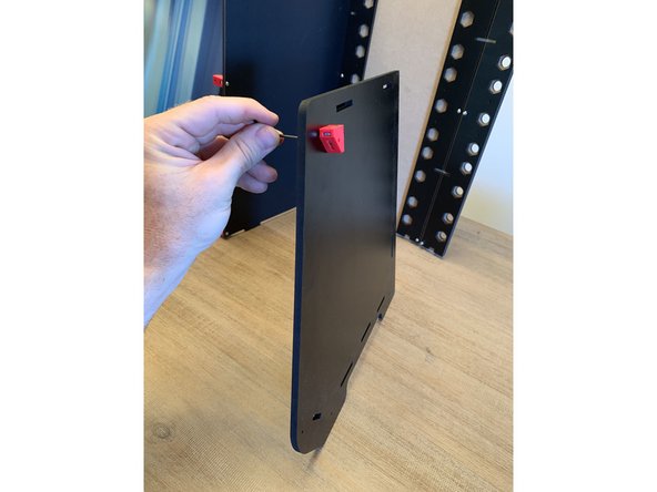 If you have custom sidepanels, Lay them on the outside of each of the melamine panels prior to running the 16mm screw through to attach the bracket.