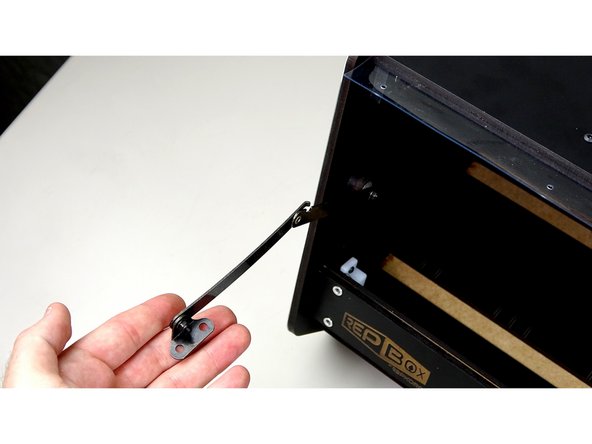 Secure the End Mount in place with a nylock. Do NOT over tighten. It needs to move freely.