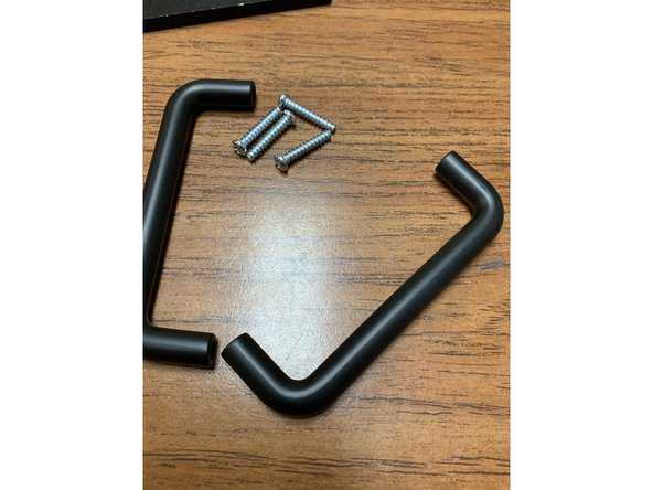 Prep both sets as pictured. We'll be using these screws to prep the rest of the lid in the next step.