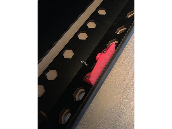 Attach the latch plate to the box with two 16mm screws as shown here.