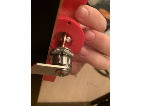 The 3D printed handle comes printed in place with small anchors to hold the front latch to the rear. If you have the seal kit you need to break those connections free by grabbing the front and rear handles with each hand and rotating in opposite directions. Cut the connections with flush cutters or a hobby knife to release more easily.