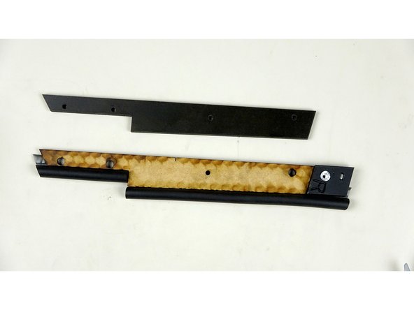 Attach the P gasket to the lip of the bottom of the seal bar.