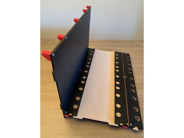 If you're WALL MOUNTING the rear brackets will be flipped around to act as the hooks over the wood wall cleat as shown in pic 3. Press the nuts into the corner of the bracket at the end where it runs perpendicular to the leg of the triangle as shown in pic 3. For more detail views of the wall mounting setup please see the wall mount guide.