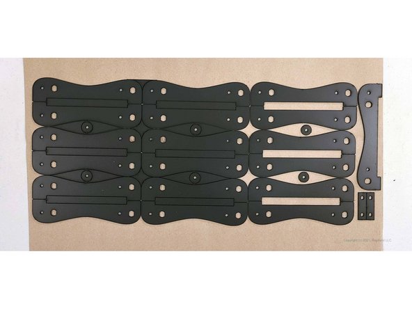 The styrene part sheet holds 6 styrene washers, 19 roller legs, and two part 30 pieces.  The part 30 pieces are old-style, lower front braces, both actually supplanted now by a more rigid, 3D-printed part.