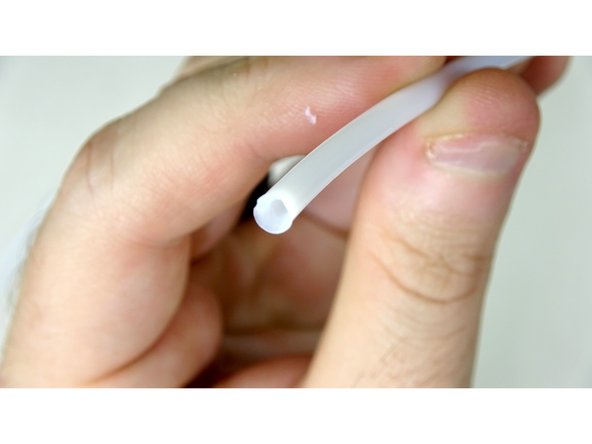 Using a craft knife, carefully ream out one of the ends of each tube into a 'cone' shape. This will make inserting filament into the tube easier.