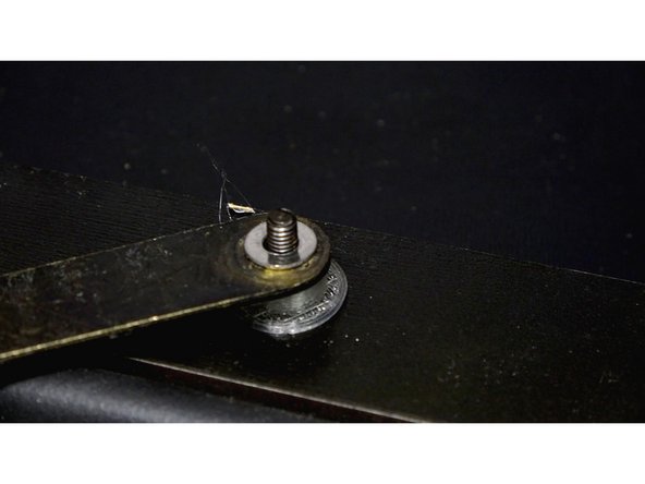 Insert 25mm bolt through the graphic panel, through the seal bar.