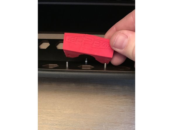 Attach the latch plate to the box with two 16mm screws as shown here.