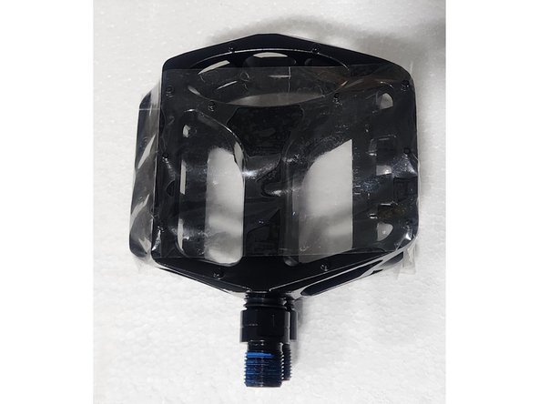 Tape the pedals together using packing tape.