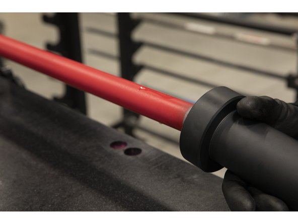 Carefully slide the sleeve off the bar shaft.