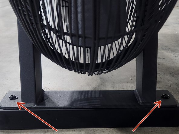 Remove the packing spacer located under the fan using a phillips screwdriver.