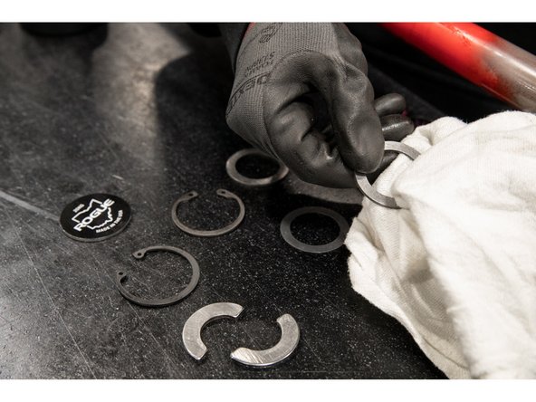 Wipe the excess oil off all hardware components.