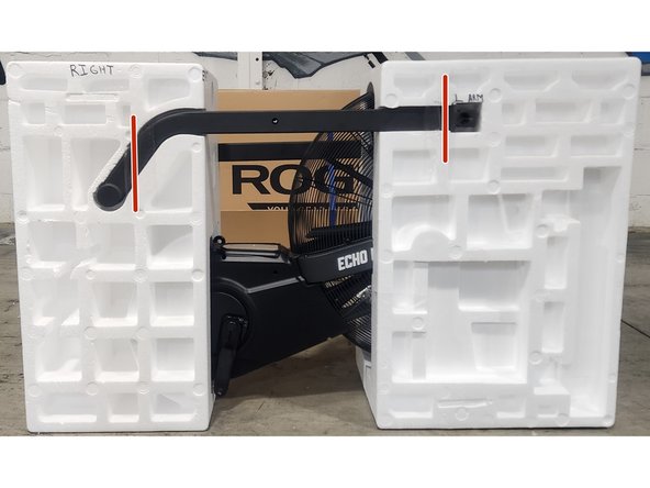 Insert the left arm into the right side of the clamshell.  Secure using 2 pieces of packing tape.