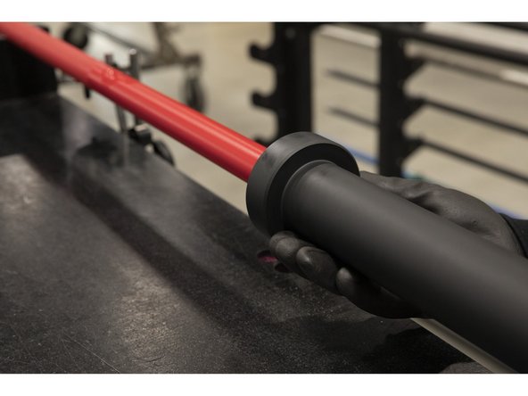 Slowly and carefully slide the sleeve onto the shaft, collar-side first.