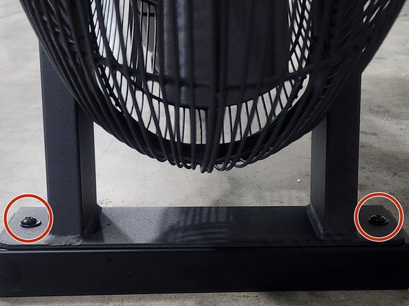 Install the front shipping spacer using the 2 phillips head screws and washers.  Do not overtighten.