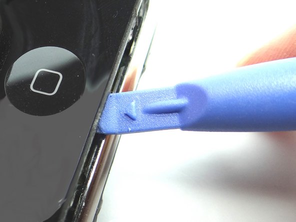 Picture 2: Pry up just enough to insert the blue pry tool.