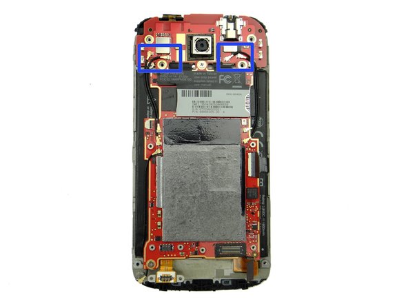 Picture 3: Make sure the lower antenna is tucked under the logic board as pictured.