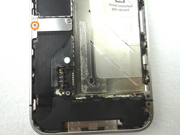 Picture 2: Replace the 1.2 mm Phillips screw from SLOT 8.