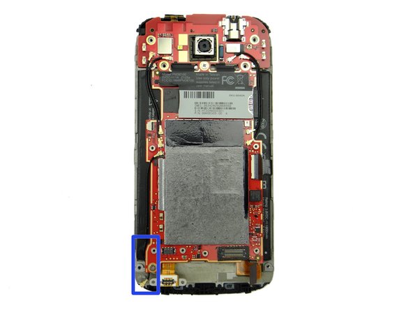 Picture 3: Make sure the lower antenna is tucked under the logic board as pictured.