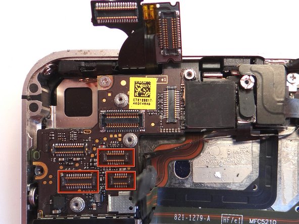 Reconnect the three cables just below the camera slot.  Make sure the cable heads are completely depressed into their sockets on the logic board.