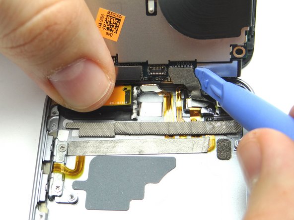 Disconnect rear camera cable.