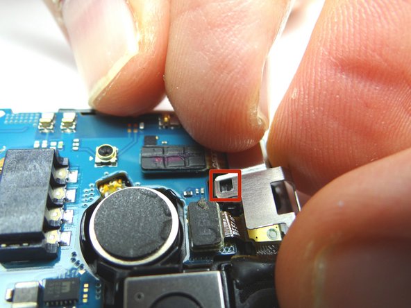 Picture 2: Make sure tab is lined up (red square) and push metal shield into place.