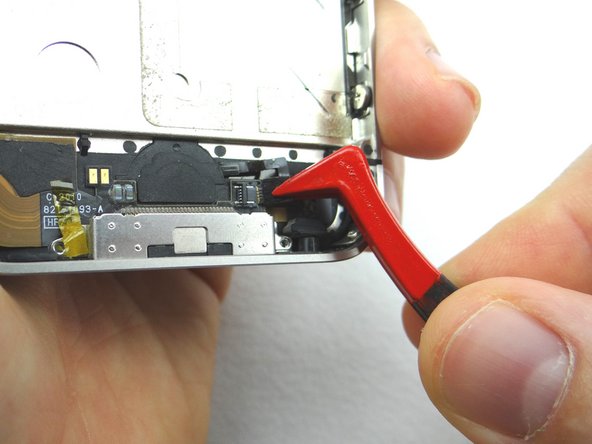 Picture 2: Use the pointed edge of the Black Spudger to flip the ZIF connector to the &quot;open&quot; position.