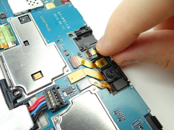 With the ZIF connector open, use your finger to pull the cable free.