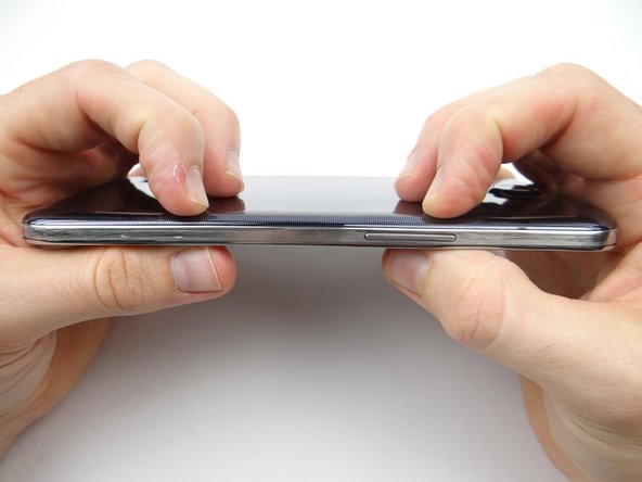 Replace the battery cover from ZONE V.  Check around the perimeter to ensure all clips are snapped into place.