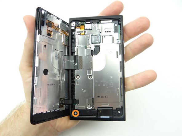 Picture 1: Replace two 4.4 mm T5 Torx screws from SLOT 2.