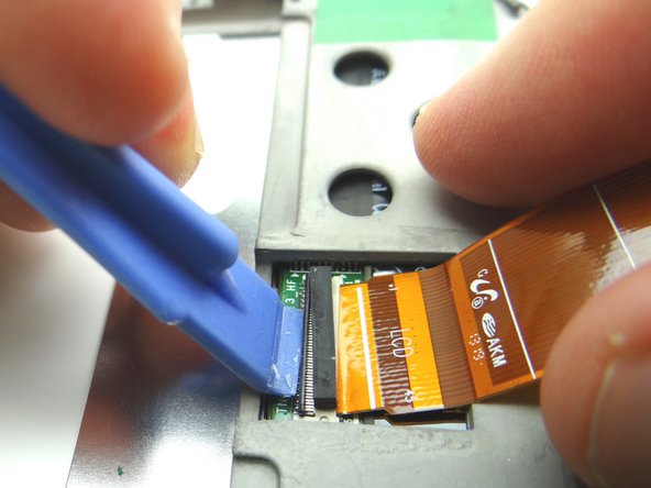 Open ZIF connector on front panel and pull cable free.