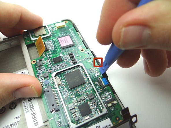 Pictures 1 &amp; 2: Wedge the blue pry tool between the logic board and front panel exactly where shown.  Pry just enough to pivot the logic board around the notch in the red square.